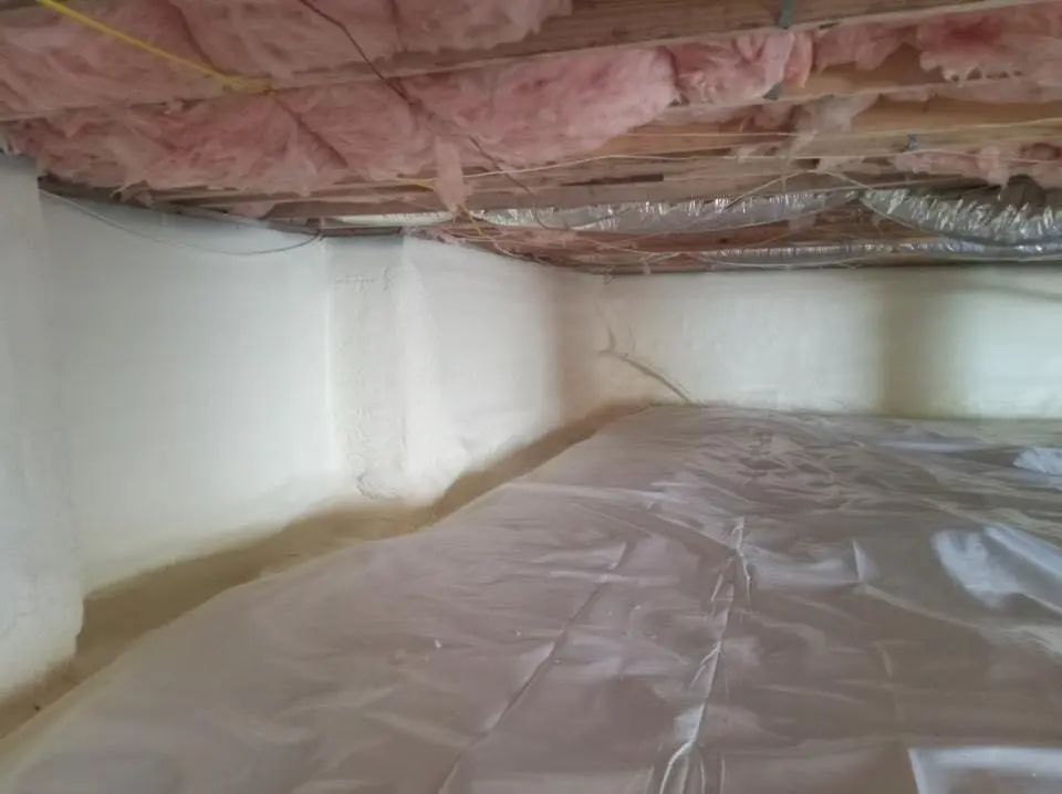 Crawl space encapsulation with closed-cell spray foam for Storm Damage Roof Repair in North Druid Hills